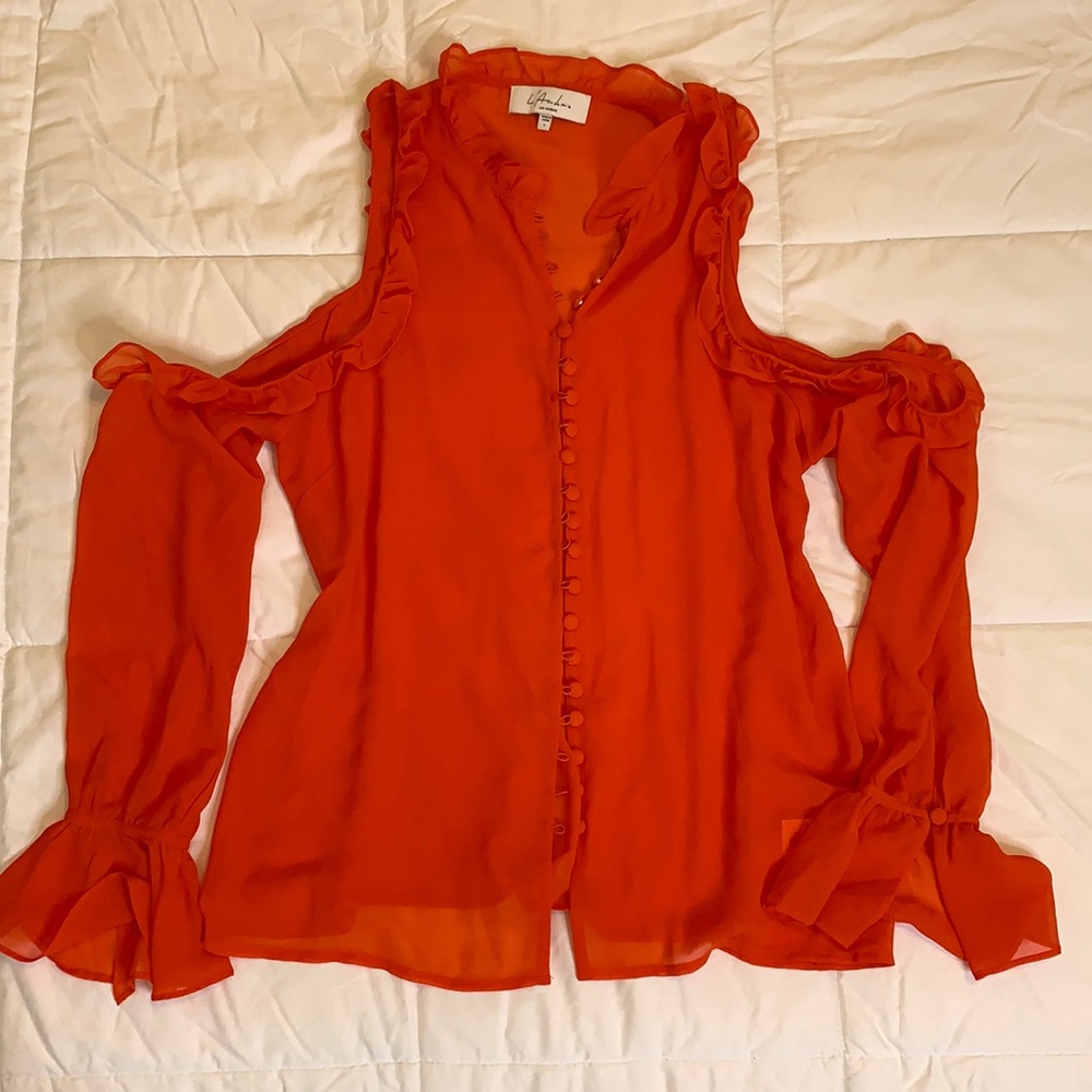 ASOS red, long sleeve blouse with ruffled and buttons.